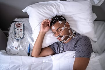patient sleeping in medical clinic doing polysomnography